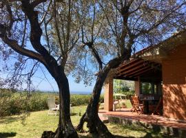 Cottage Gaia with sea view, fenced garden by ToscanaTour, hótel í Guardistallo