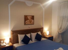 Pantheon Deluxe Apartments, beach rental in Archangelos