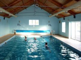 Quilty Holiday Cottages - Type B, cabaña o casa de campo en Quilty