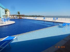 Flat entre Mar e Lagoa, apartament cu servicii hoteliere din Arraial do Cabo