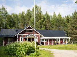 Männikkölän Pirtti, cabana o cottage a Nurmes