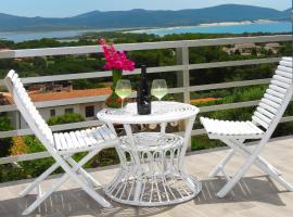 Panohome, hotell i Porto Pino