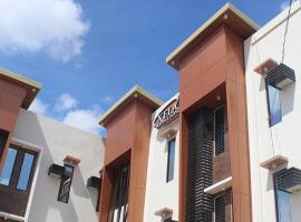 Xela Suites and Hotel, hotel em Sanipon