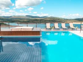 Pousada Suítes do Lago, hotel dengan jacuzzi di Capitolio