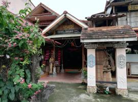 Chian Guesthouse, quarto em acomodação popular em Chiang Rai