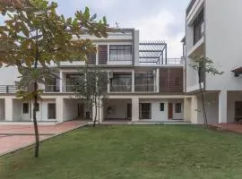 StayVista's Greenwoods Villa 9 - City-Center Villa with Private Pool, Terrace, Lift & Ping-Pong Table