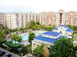 1BR with Balcony Overlooking Pool Chateau Elysee Near NAIA
