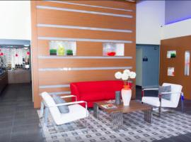 Arya Inn & Suites, hotel a Farmers Branch