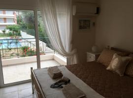 Lovely Appartments Lygia Korinthias, hotel with parking in Liyiá