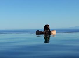 The Infinity 180 Luxury Suites, hotel with hot tubs in Milia
