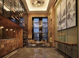 Bloom Boutique Hotel, hotell i Chongqing