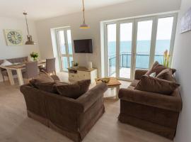 Komfort-Ferienwohnung Waterkant by Meer-Ferienwohnungen, ξενοδοχείο με υδρομασάζ σε Olpenitz