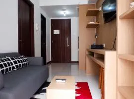 Cozy 1BR Scientia Residence Apartment near Summarecon Mall Gading Serpong By Travelio