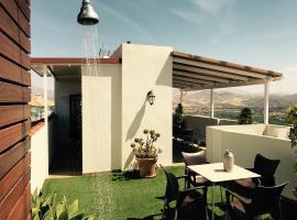 Ático Guadalhorce - Solárium privado con barbacoa, hotel en Álora