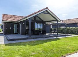 Holiday home with lovely terrace, villa in Kattendijke