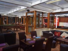 Zemu izmaksu kategorijas viesnīca Cheers Cafe Bar & Tavern pilsētā Freizerbērga