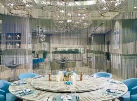 Grand Millennium Muscat connected to Muscat Grand Mall, hotel di Muskat
