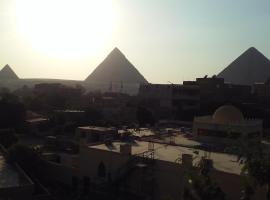 Maged Pyramids View Inn, hôtel au Caire