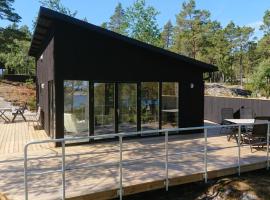 Kvarnsands Strandstugor / Kvarnsand Beach Lodges, lodge en Grisslehamn