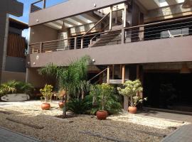 Residencial La Ferrugem - Pe na Areia, homestay in Garopaba