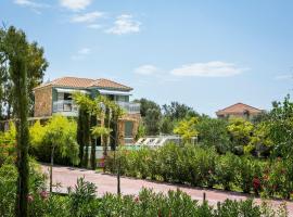 Afrodite Luxury Villa: Svoronata, Ammes Plajı yakınında bir otel