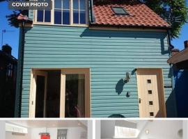 Beach hut seaside cottage, hotel en Sheringham