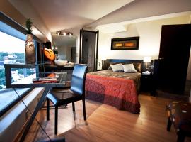 Aztic Hotel and Executive Suites, hotelli Méxicossa lähellä maamerkkiä Six Flags México -huvipuisto