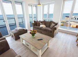 Komfort-Ferienwohnung Dat Penthuus by Meer-Ferienwohnungen, ξενοδοχείο με υδρομασάζ σε Olpenitz