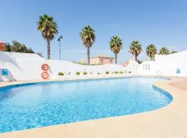 Bonito apartamento en campo de golf con piscina