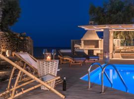 Damma Beachfront Luxury Villa, casa o chalet en Kamari