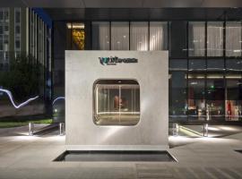 The Lucid Hangzhou XiXi Wetland Hotel، فندق مع أحواض استحمام ساخنة في هانغتشو