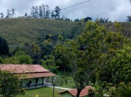 Pousada Viajantes do Tempo, hotell i Cunha