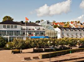 Grand Hotel Åsgårdstrand - Unike Hoteller、Åsgårdstrandにあるサンネフヨル・トルプ空港 - TRFの周辺ホテル