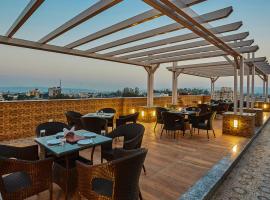 Treebo Trend Grand Legacy Elite With Roof Top Cafe, hotel en Dehradun
