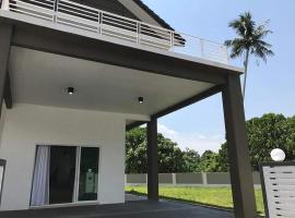 Greenville Homestay, habitación en casa particular en Balik Pulau