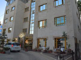 Capri Hotel Suites, hotel din apropiere 
 de Diwan al-Sultan Ibrahim Restaurant, Amman