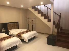 Bole Saihu Yunshang Hotel, מלון בBole