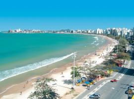 SEGUNDA CASA - Seu cantinho em Guarapari, 1 minuto a pé da Praia do Morro! Suítes confortáveis e modernas - Para casal ou para grupos de até 5 pessoas, hostal o pensión en Guarapari