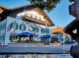 Ferienwohnungen im Gasthof Stern inklusive KönigsCard, hotel in Unterammergau