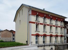 Fioralpino Suites, отель в городе Sospirolo