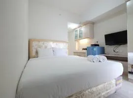 Minimalist Studio Room at The Springlake Apartment Sumarecon Bekasi By Travelio