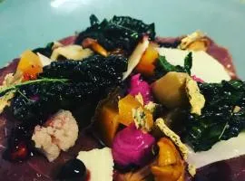 Vita Stenen Rum och Restaurang