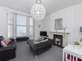 Spacious one bedroom apartment with a sofa bed offering a sea view sleeps four