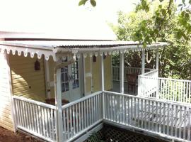 Spice Cottage, cabaña o casa de campo en Five Islands Village