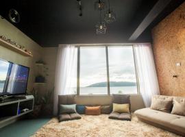 Homy Seafront Hostel, hotell i Kota Kinabalu