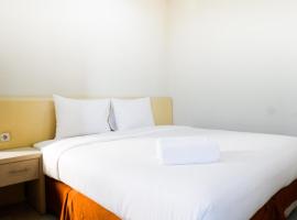 Comfy 1BR Twin Tower Apartment By Travelio, hotel a Surabaya