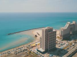 מגדל אלמוג חיפה - דירות "בלו ביץ'" על הים, hotel in zona Carmel Beach, Haifa