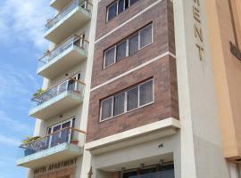 Roots Apartment Hotel, hotell i Accra