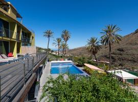 Holidays & Health in Finca Oasis - APART 5, отель с бассейном в городе Сан-Роке