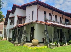 Cosy Nest Home stay, hotel blizu znamenitosti Maris Stella College, Negombo